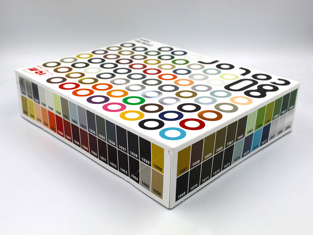 ICM acrylic paint box of 80 x colours.  Displaying the contents, numbered  swatches of the included colours, set against a clean white studio background.