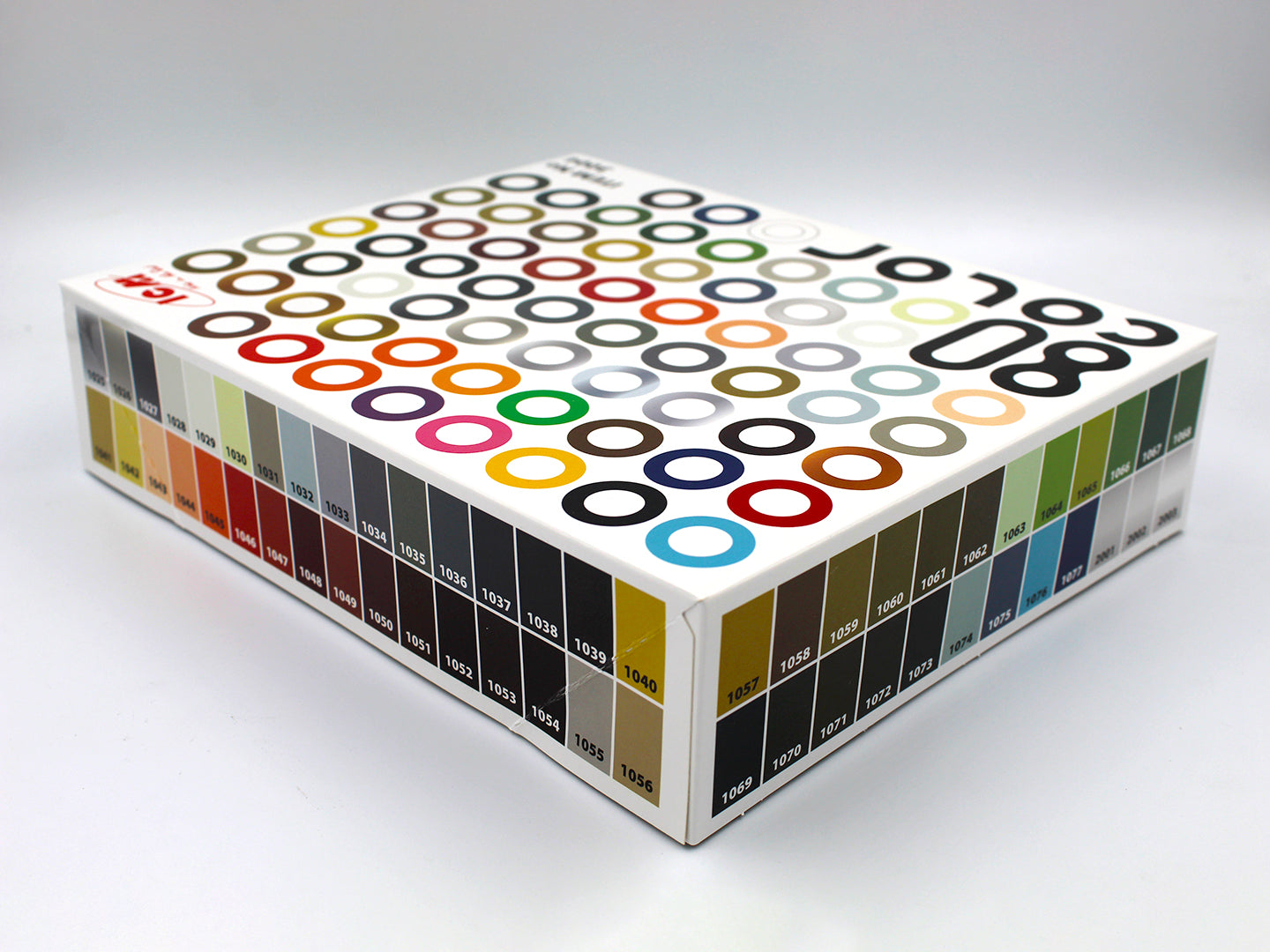 ICM acrylic paint box of 80 x colours.  Displaying the contents, numbered  swatches of the included colours, set against a clean white studio background.